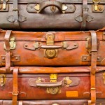 17591878 - vintage battered brown bags stacked vertically